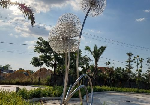 Guided tour near My Hanh town center for land plot buyers.